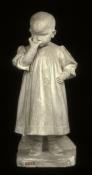 La Boudeuse (Jeune enfant suçant son pouce), par Lucien Schnegg